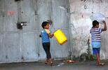 Izraleskie dzieci idą po wodę, PAP/EPA