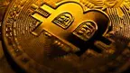 bitcoin-coin-closeup-black-background-background-with-cryptocurrency.webp