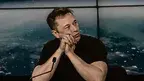 Elon_Musk_at_a_Press_Conference.webp